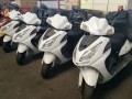 Large Quanity of New and Used Motorcycles and Scooters 6